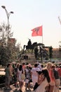 Tirana, Albania, August 2013. A group of tourists in front of the monument to the national hero.