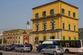 Street in the capital of Albania - Tirana with houses, a road and cars. Many shops