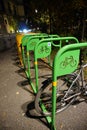 Bicycle locked in Green and yellow bicycle stands in Skanderbeg Square Tirana, Albania