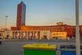 TIRANA, ALBANIA: Tirana Marriott Hotel and Arena Center skyscraper with red decorative elements and wall of glass.