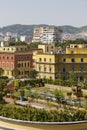 Tirana, Albania, July 8 2019: Downtown Tirana with various ministries in the yellow houses in the foreground