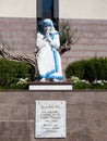 Statue of a Seated, Praying Mother Teresa at St. Paul`s Roman Catholic Cathedral in Tirana Albania