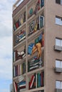 Tirana, Albania - September 1th 2022: Albaniant Street Art. Mural painting on the facade of the Kadare Museum - The Studio House