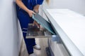 X-ray room in a hospital ER operating room with a classic ceiling-mounted x-ray system.