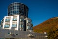 TIRANA, ALBANIA: Unusual modern hotel building. Beautiful landscape with views of Dajti Mountain. Royalty Free Stock Photo