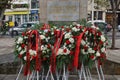 Floral wreathes placed under the plaque for Tirana's Liberation Day