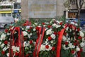 Floral wreathes placed under the plaque for Tirana's Liberation Day.