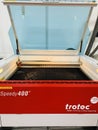 Closeup of programmable laser cutting machine engraving picture