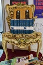 Complete works of Gjergj Fishta, on a traditional chair in 'Tirana Book Fair'