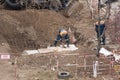 Tiraspol, Unrecognized Republic of Transnistria - November 18, 2021 A team of workers carries out repair work on a heating network