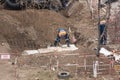 Tiraspol, Unrecognized Republic of Transnistria - November 18, 2021 A team of workers carries out repair work on a heating network