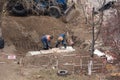 Tiraspol, Unrecognized Republic of Transnistria - November 18, 2021 A team of workers carries out repair work on a heating network