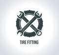 Tire fitting. Black tire icon. Icon for tire service. Royalty Free Stock Photo