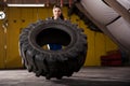 Tire flip in a gym Royalty Free Stock Photo