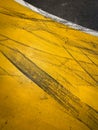 Tire marks on road. Race track. Yellow and black asphalt Royalty Free Stock Photo