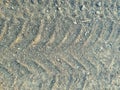 Tire marks in the sand - picture,Tire`s tracks print in Sand Royalty Free Stock Photo