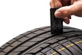 Tire measuring Royalty Free Stock Photo