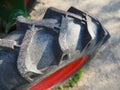 tire from a motor-cultivator. A close-up of a wheel from a small farm tractor. Rubber thread. Industrial details.