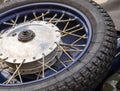 Tire motorcycle wheel with metal spokes