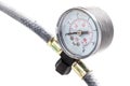 Tire pressure gauge in the studio on a white background Royalty Free Stock Photo