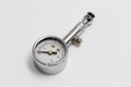 Tire pressure gauge on white background Royalty Free Stock Photo