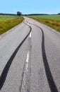 Tire print on the asphalt road