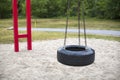 Tire swing on playground in the park Royalty Free Stock Photo