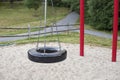 Tire swing on playground in the park Royalty Free Stock Photo