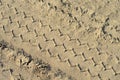 Tire track in a sand Royalty Free Stock Photo