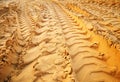 Tire tracks on the sand. Royalty Free Stock Photo