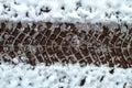 Tire Tracks in Snow Royalty Free Stock Photo