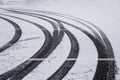 Tire tread marks on fresh snow fall driveway Royalty Free Stock Photo