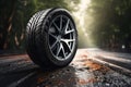 Tire on a wet road. Summer theme with copy space. Stormy weather driving safety concept. Generative Ai Royalty Free Stock Photo