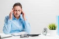 Tired accountant with migraine Royalty Free Stock Photo