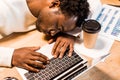 tired african american businessman sleeping at Royalty Free Stock Photo