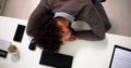 Tired African Businessman Sleeping In Office Royalty Free Stock Photo