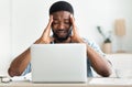 Freelancer suffering from headache after hours of work on laptop Royalty Free Stock Photo