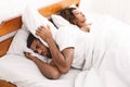 Tired and annoyed man of his girlfriend snoring Royalty Free Stock Photo