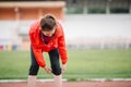 Woman runner taking a rest after running hard