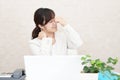 Tired Asian business woman Royalty Free Stock Photo