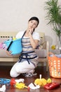 Tired Asian housewife Royalty Free Stock Photo