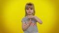 Tired blonde child girl showing time out gesture, limit or stop sign no pressure, i need more time Royalty Free Stock Photo