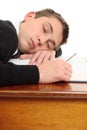 Tired bored student at desk Royalty Free Stock Photo