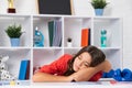 Tired and bored teenager school girl. Schoolgirl is sleeping while doing homework, tired from studying, exhausted. Royalty Free Stock Photo