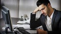 Tired bored young businessman in office Royalty Free Stock Photo