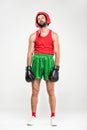 tired boxer in retro helmet and boxing gloves