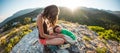 The tired boy lies on his mother`s feet Royalty Free Stock Photo