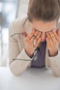 Tired business woman with eyeglasses Royalty Free Stock Photo