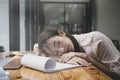 Tired business woman sleeping at her office desk. Royalty Free Stock Photo