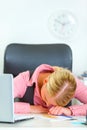 Tired business woman sleeping on office desk Royalty Free Stock Photo